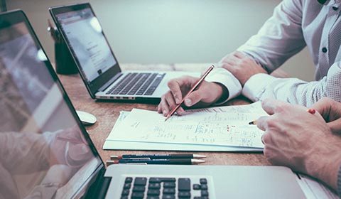 two business people meeting and creating a strategy
