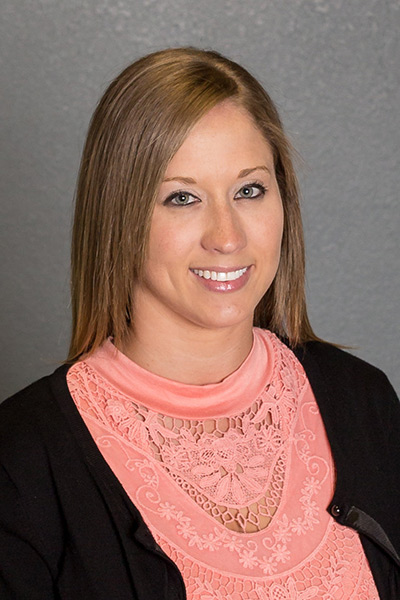 Stacy Gray smiling for the camera