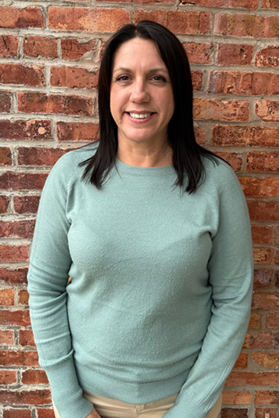 Janet Chapman smiling for the camera